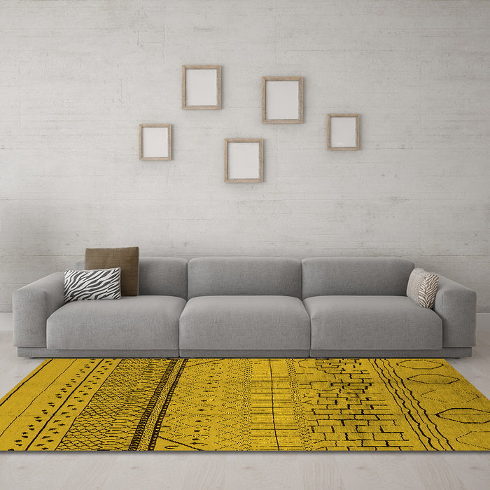 Machine Washable Solid Yellow Modern Rug in a Living Room, wshurb1250yw