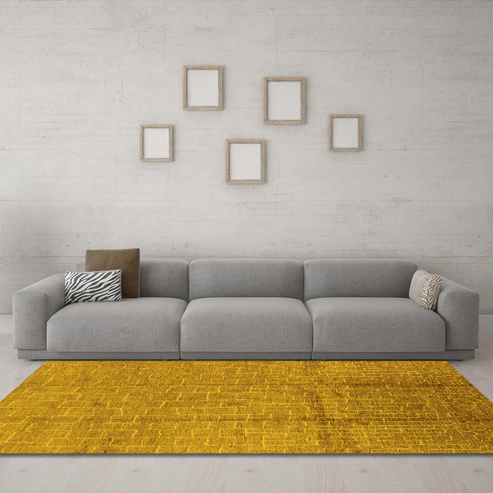 Machine Washable Solid Yellow Modern Rug in a Living Room, wshurb1251yw