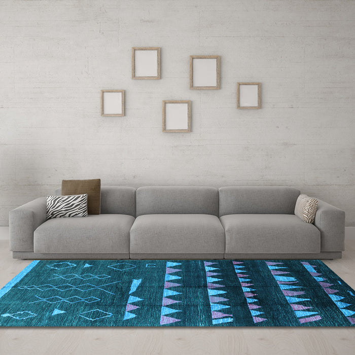 Machine Washable Solid Light Blue Modern Rug in a Living Room, wshurb1253lblu