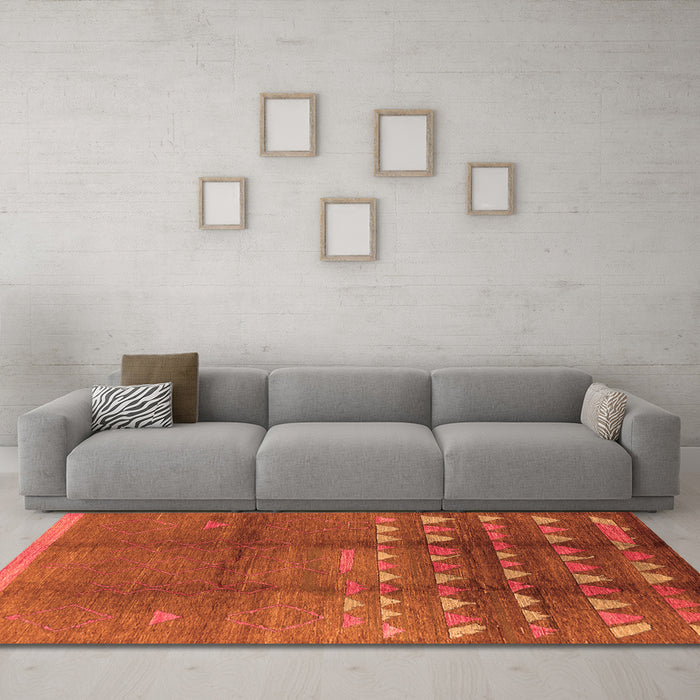 Machine Washable Solid Orange Modern Area Rugs in a Living Room, wshurb1255org