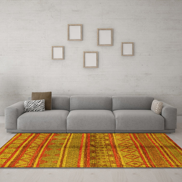 Machine Washable Solid Yellow Modern Rug in a Living Room, wshurb1256yw