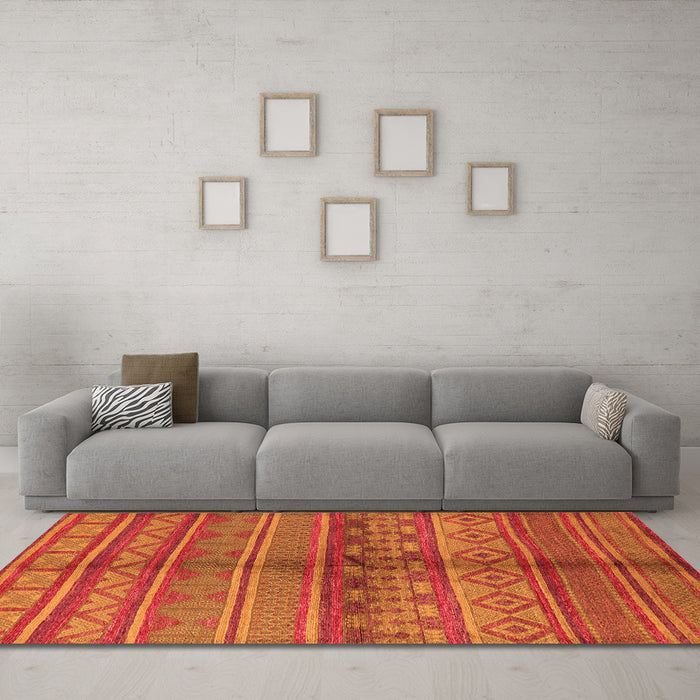 Machine Washable Solid Orange Modern Area Rugs in a Living Room, wshurb1256org