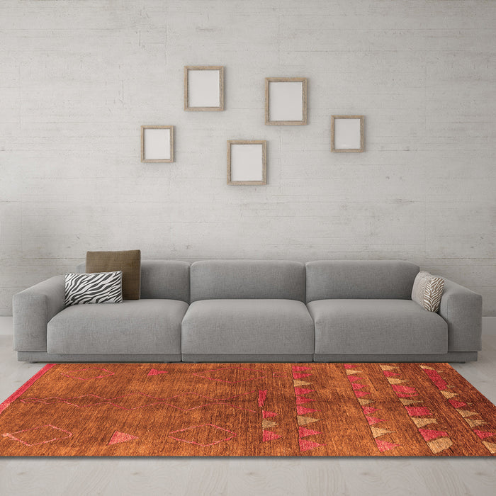 Machine Washable Solid Orange Modern Area Rugs in a Living Room, wshurb1257org