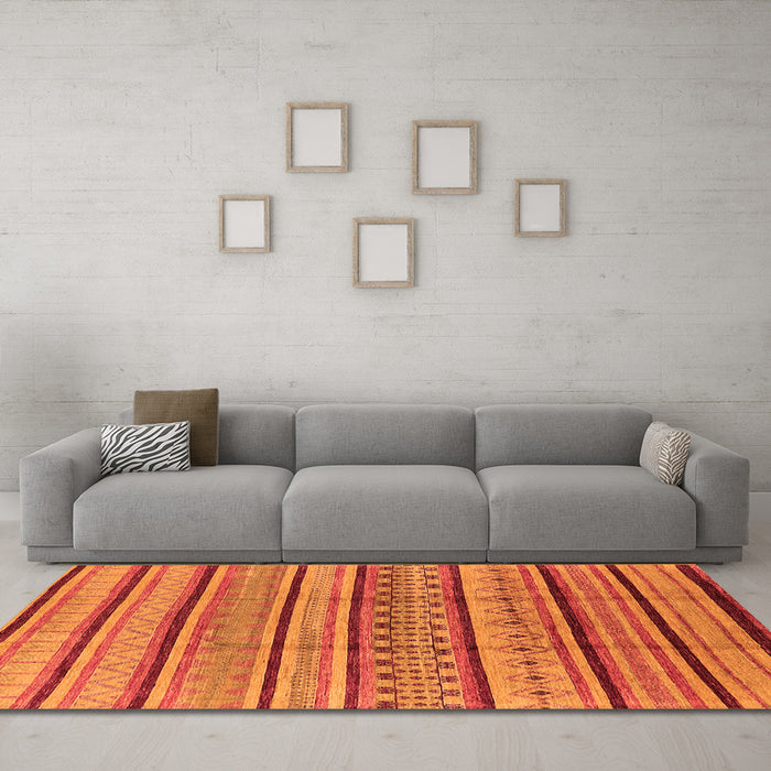 Machine Washable Solid Orange Modern Area Rugs in a Living Room, wshurb1260org