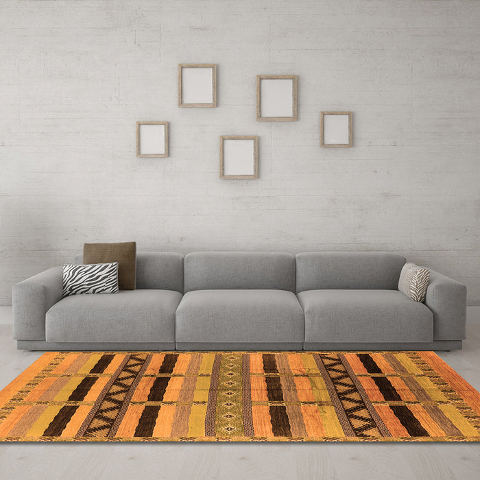 Machine Washable Solid Orange Modern Area Rugs in a Living Room, wshurb1265org