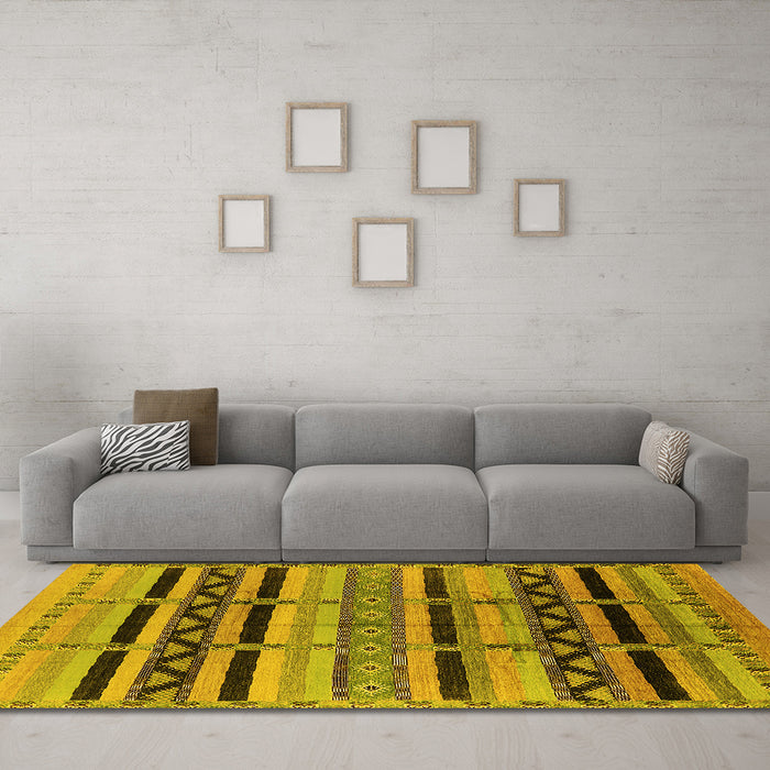 Machine Washable Solid Yellow Modern Rug in a Living Room, wshurb1265yw