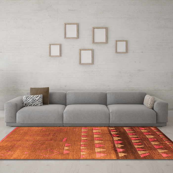 Machine Washable Solid Orange Modern Area Rugs in a Living Room, wshurb1270org