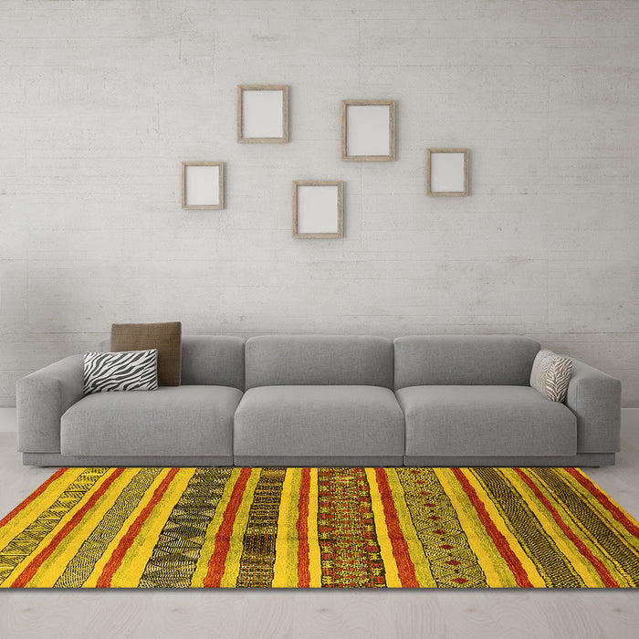 Machine Washable Solid Yellow Modern Rug in a Living Room, wshurb1274yw