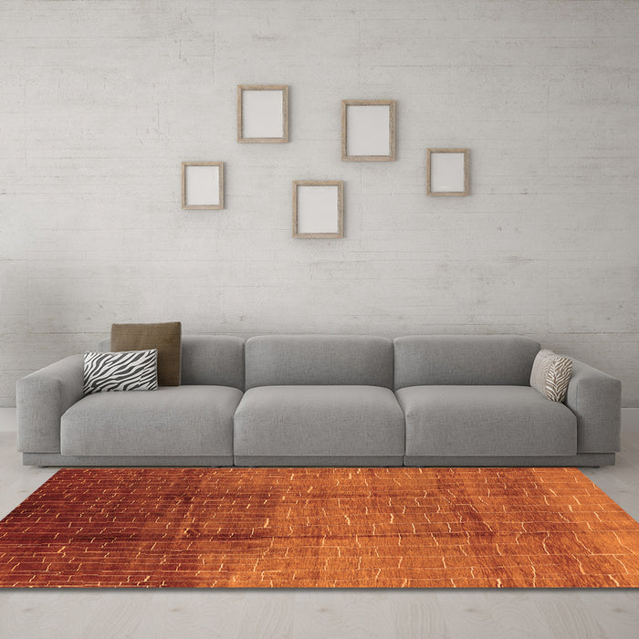Machine Washable Solid Orange Modern Area Rugs in a Living Room, wshurb1284org