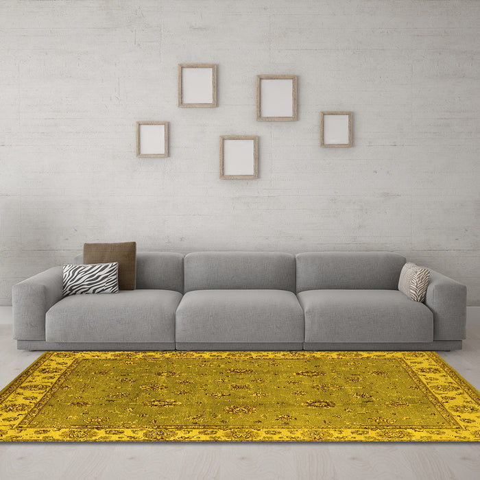 Machine Washable Oriental Yellow Traditional Rug in a Living Room, wshurb1324yw