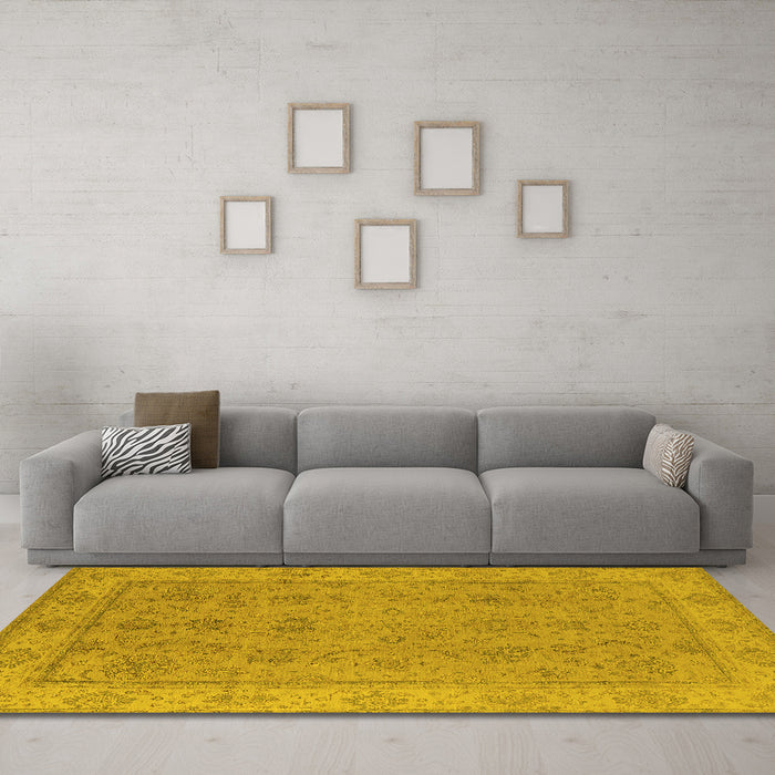 Machine Washable Oriental Yellow Traditional Rug in a Living Room, wshurb1325yw