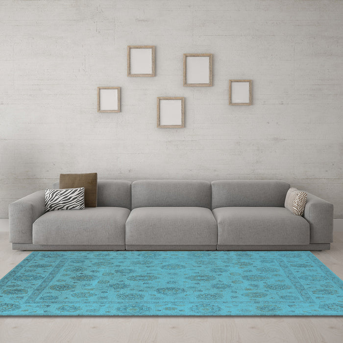 Machine Washable Oriental Light Blue Traditional Rug in a Living Room, wshurb1328lblu