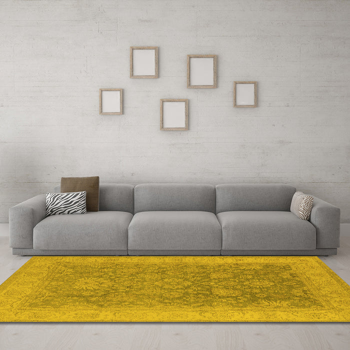 Machine Washable Oriental Yellow Traditional Rug in a Living Room, wshurb1334yw