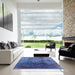 Square Mid-Century Modern Blue Persian Rug in a Living Room, urb1389