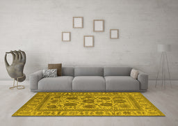 Machine Washable Oriental Yellow Traditional Rug in a Living Room, wshurb1402yw