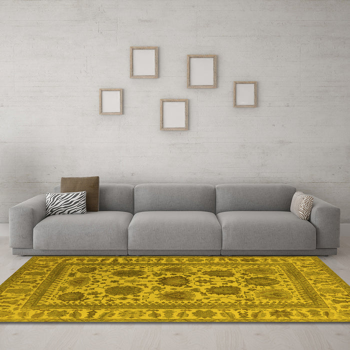 Machine Washable Oriental Yellow Traditional Rug in a Living Room, wshurb1402yw