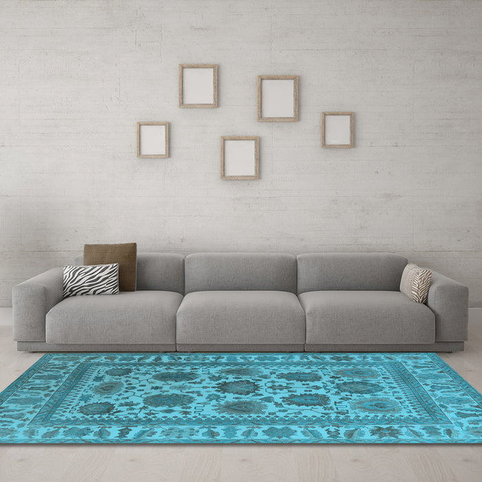 Machine Washable Oriental Light Blue Traditional Rug in a Living Room, wshurb1402lblu