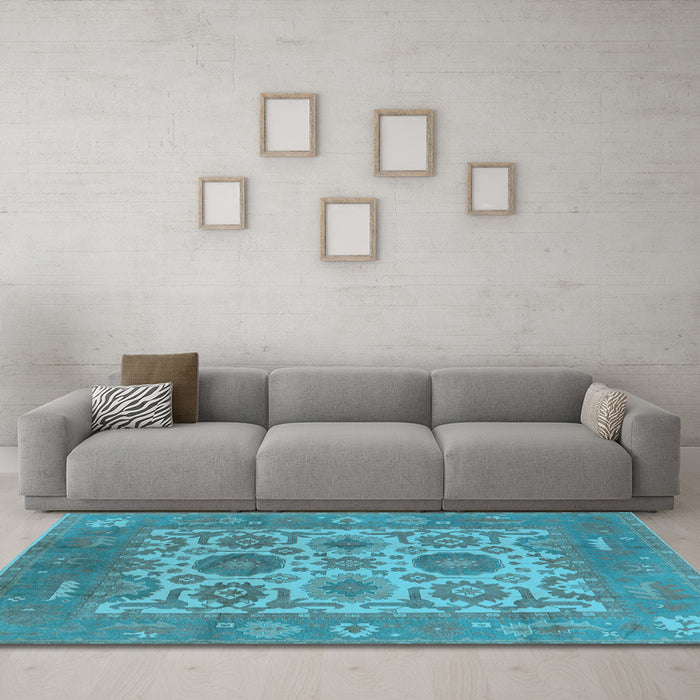 Machine Washable Oriental Light Blue Traditional Rug in a Living Room, wshurb1407lblu