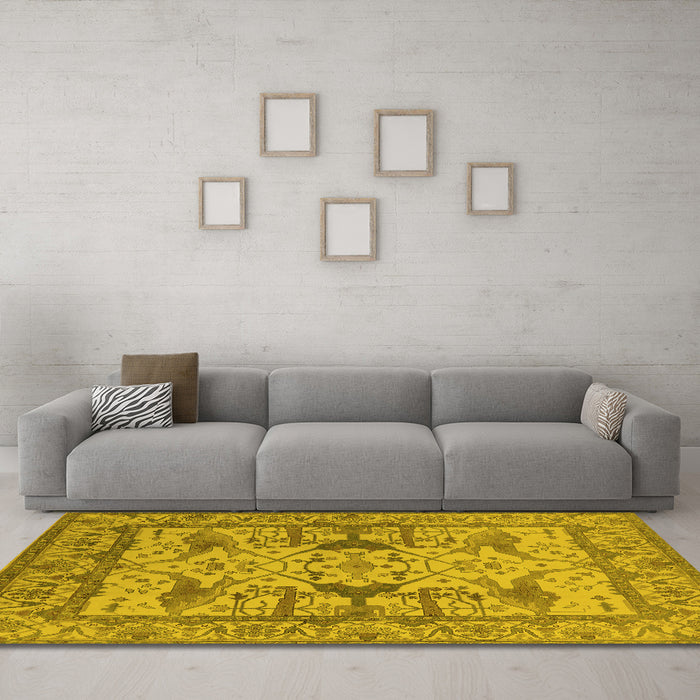 Machine Washable Oriental Yellow Traditional Rug in a Living Room, wshurb1409yw