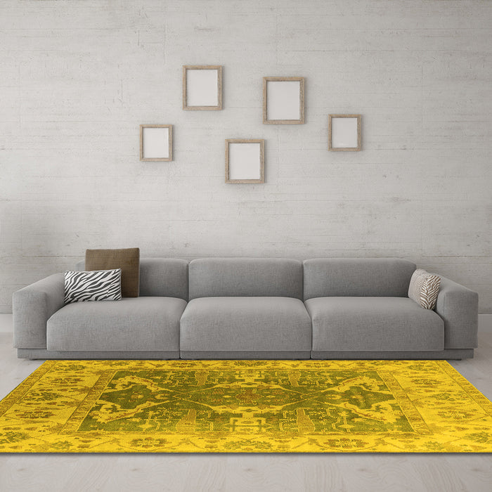 Machine Washable Oriental Yellow Traditional Rug in a Living Room, wshurb1413yw