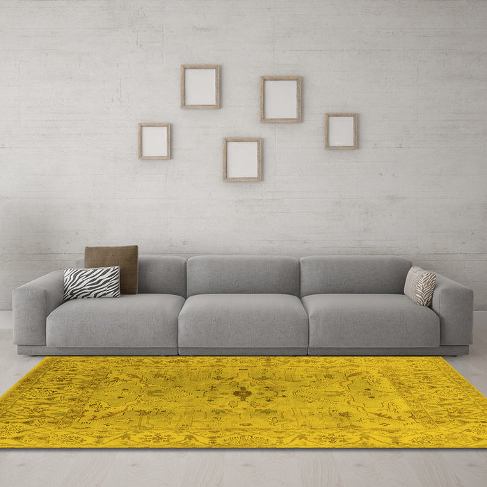 Machine Washable Oriental Yellow Traditional Rug in a Living Room, wshurb1414yw