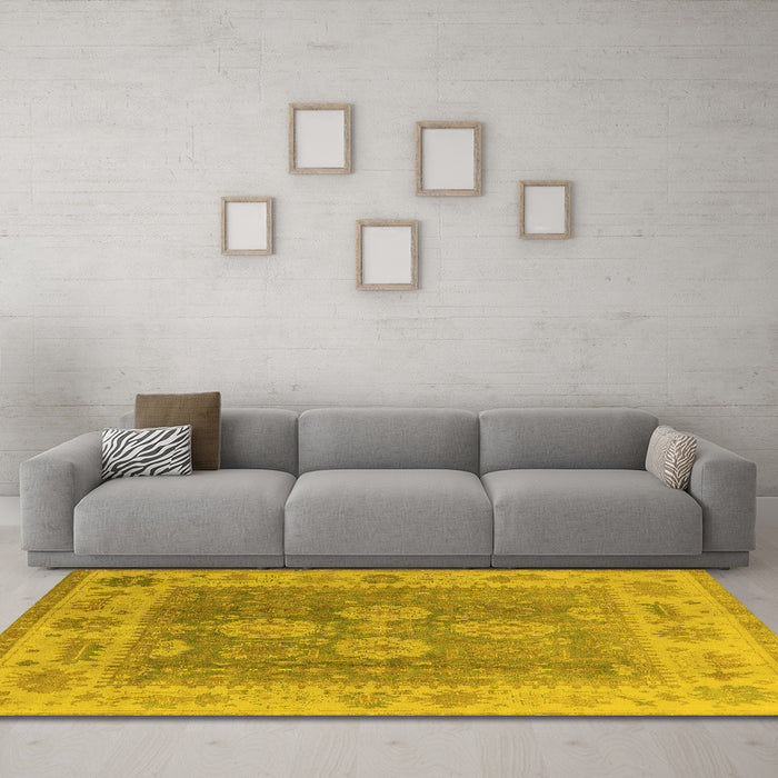 Machine Washable Oriental Yellow Traditional Rug in a Living Room, wshurb1416yw