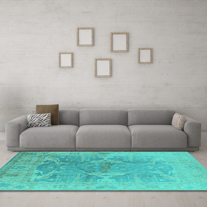 Machine Washable Oriental Turquoise Traditional Area Rugs in a Living Room,, wshurb1417turq