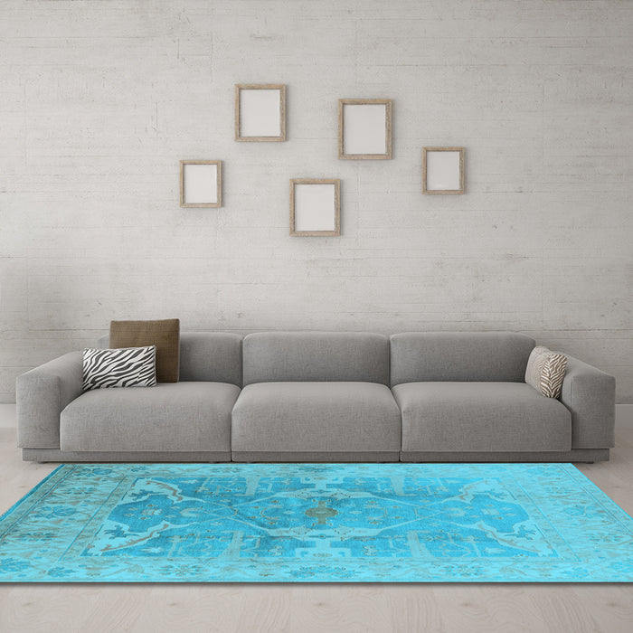 Machine Washable Oriental Light Blue Traditional Rug in a Living Room, wshurb1417lblu