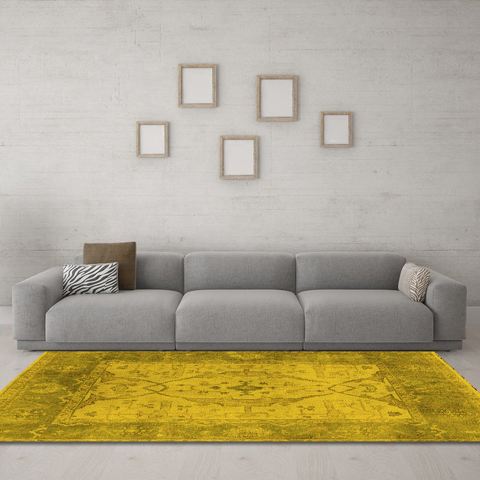 Machine Washable Oriental Yellow Traditional Rug in a Living Room, wshurb1418yw