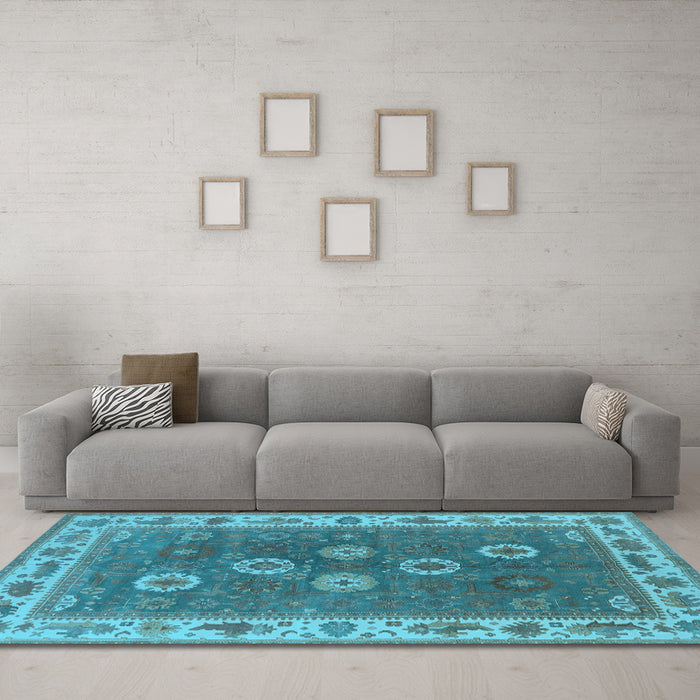 Machine Washable Oriental Light Blue Traditional Rug in a Living Room, wshurb1420lblu