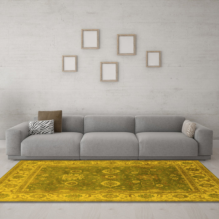 Machine Washable Oriental Yellow Traditional Rug in a Living Room, wshurb1421yw