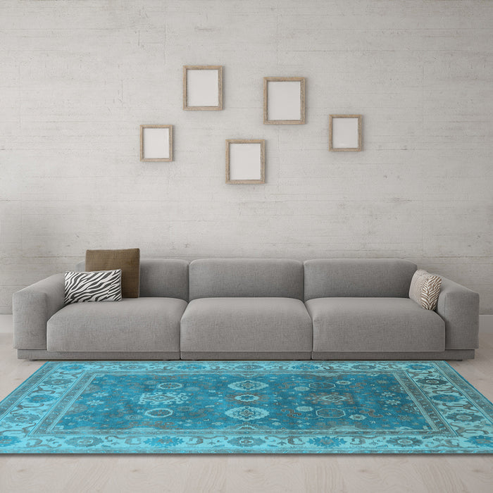 Machine Washable Oriental Light Blue Traditional Rug in a Living Room, wshurb1421lblu