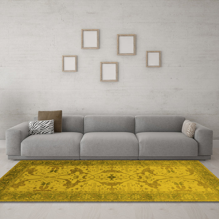 Machine Washable Oriental Yellow Traditional Rug in a Living Room, wshurb1422yw