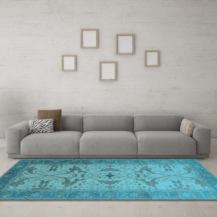 Machine Washable Oriental Light Blue Traditional Rug in a Living Room, wshurb1422lblu