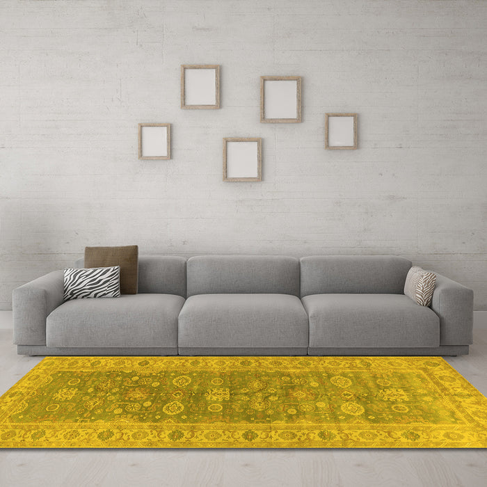 Machine Washable Oriental Yellow Traditional Rug in a Living Room, wshurb1423yw