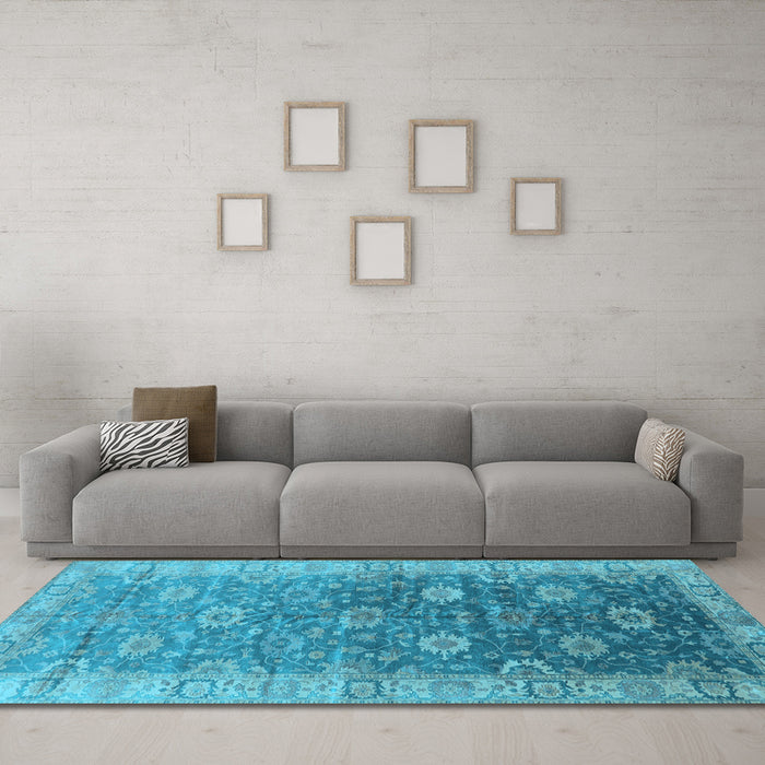 Machine Washable Oriental Light Blue Traditional Rug in a Living Room, wshurb1424lblu