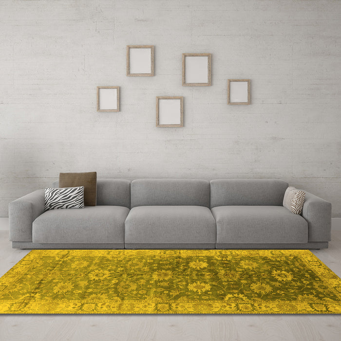 Machine Washable Oriental Yellow Traditional Rug in a Living Room, wshurb1424yw