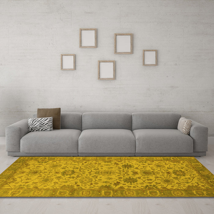 Machine Washable Oriental Yellow Traditional Rug in a Living Room, wshurb1425yw