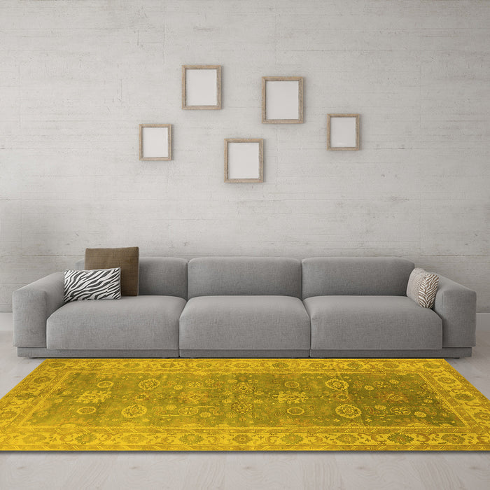 Machine Washable Oriental Yellow Traditional Rug in a Living Room, wshurb1427yw