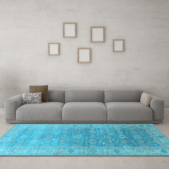 Machine Washable Oriental Light Blue Traditional Rug in a Living Room, wshurb1429lblu