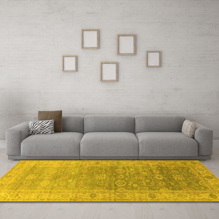 Machine Washable Oriental Yellow Traditional Rug in a Living Room, wshurb1429yw