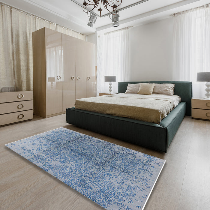 Mid-Century Modern Blue Oriental Rug in a Bedroom, urb1460