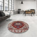 Round Mid-Century Modern Saffron Red Persian Rug in a Office, urb1469