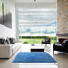 Square Mid-Century Modern Blue Persian Rug in a Living Room, urb1481