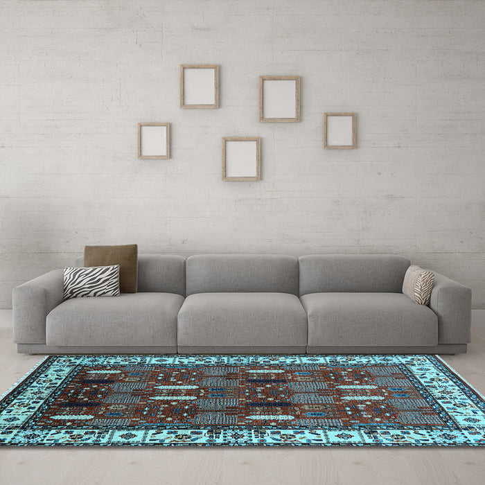 Machine Washable Oriental Light Blue Traditional Rug in a Living Room, wshurb1484lblu