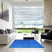 Square Mid-Century Modern Neon Blue Oriental Rug in a Living Room, urb1553