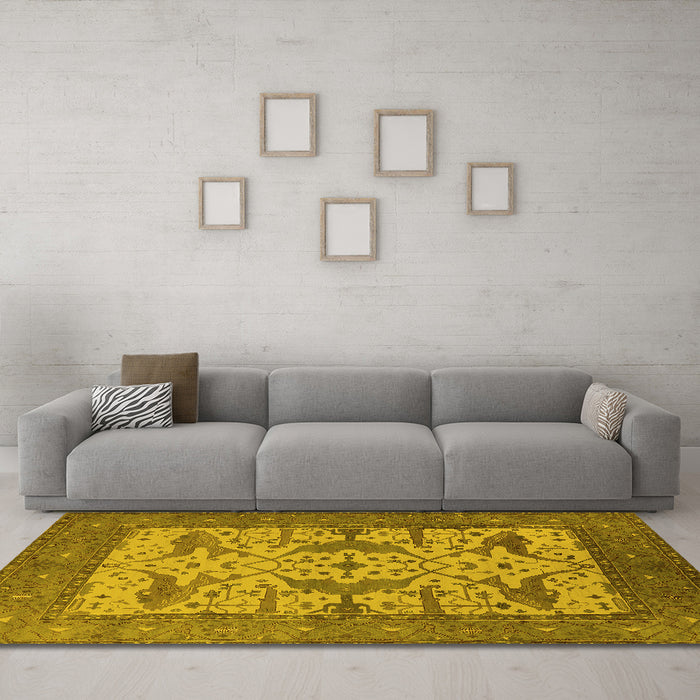 Machine Washable Oriental Yellow Industrial Rug in a Living Room, wshurb1629yw