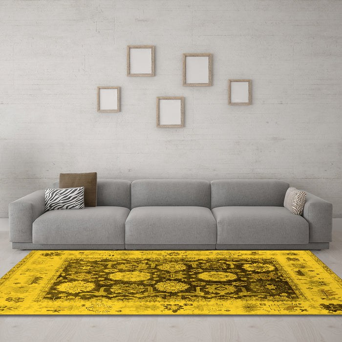 Machine Washable Oriental Yellow Industrial Rug in a Living Room, wshurb1635yw