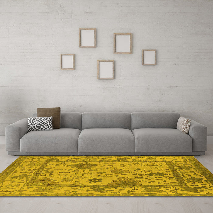Machine Washable Oriental Yellow Industrial Rug in a Living Room, wshurb1636yw