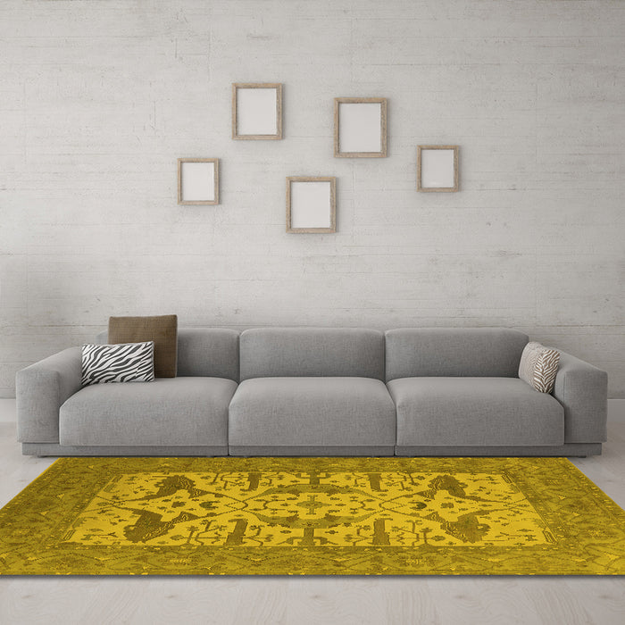Machine Washable Oriental Yellow Industrial Rug in a Living Room, wshurb1654yw